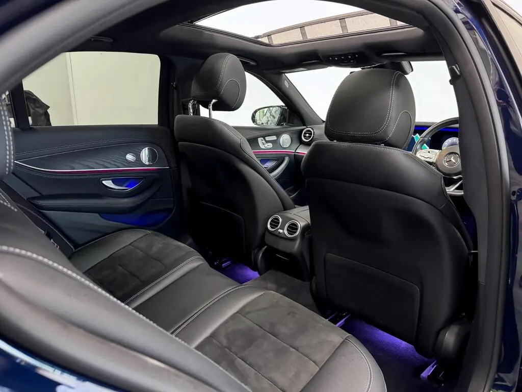 Business Class rear seat view with generous legroom