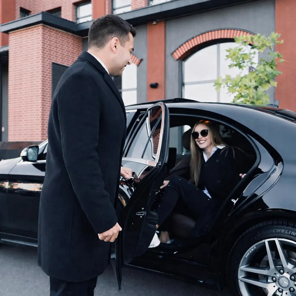 Chauffeur welcoming a VIP client