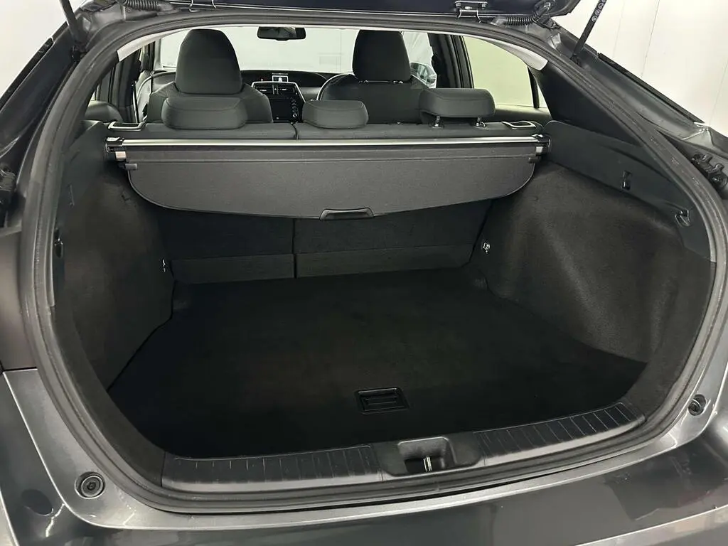 Economy Class boot space with room for three to four bags