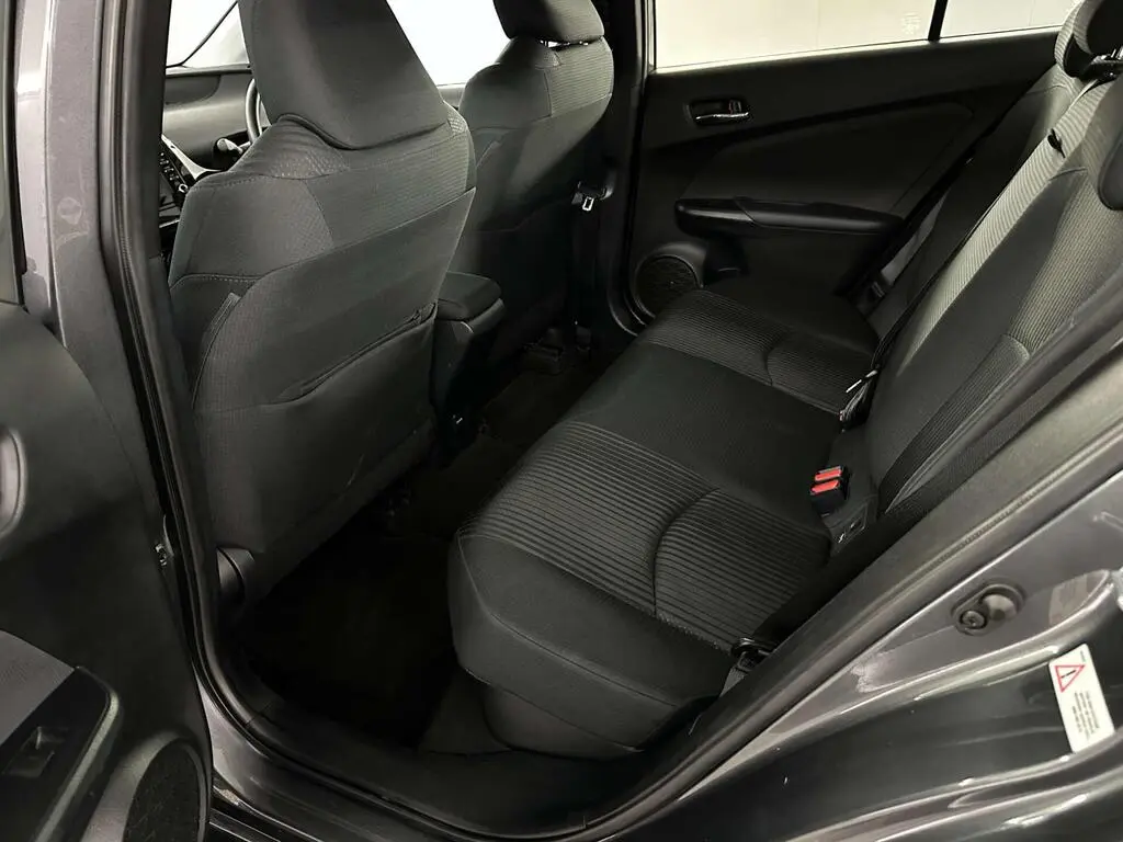 Economy Class rear bench seating for up to three passengers