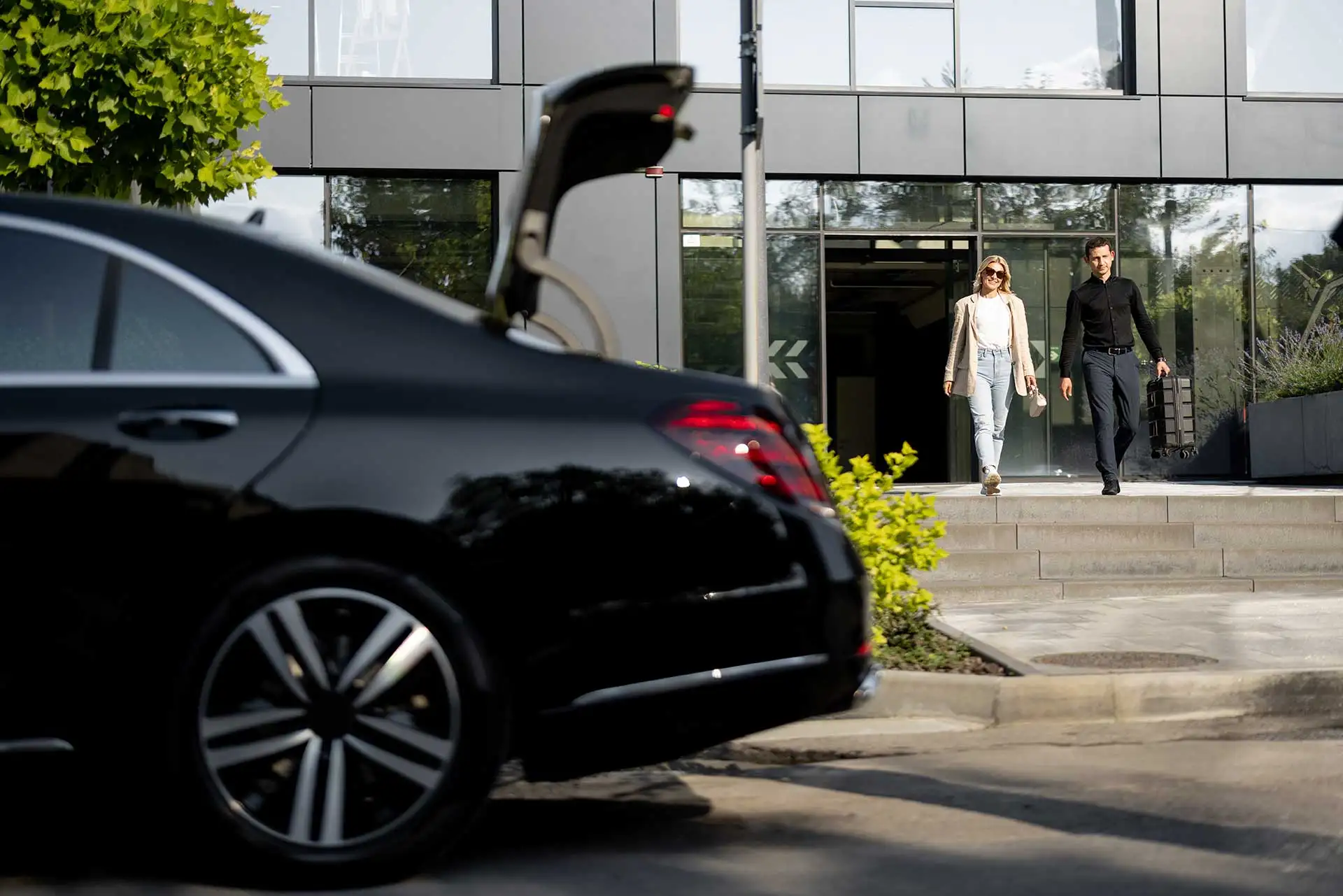 AATransfers chauffeur collecting a passenger at Exeter Airport