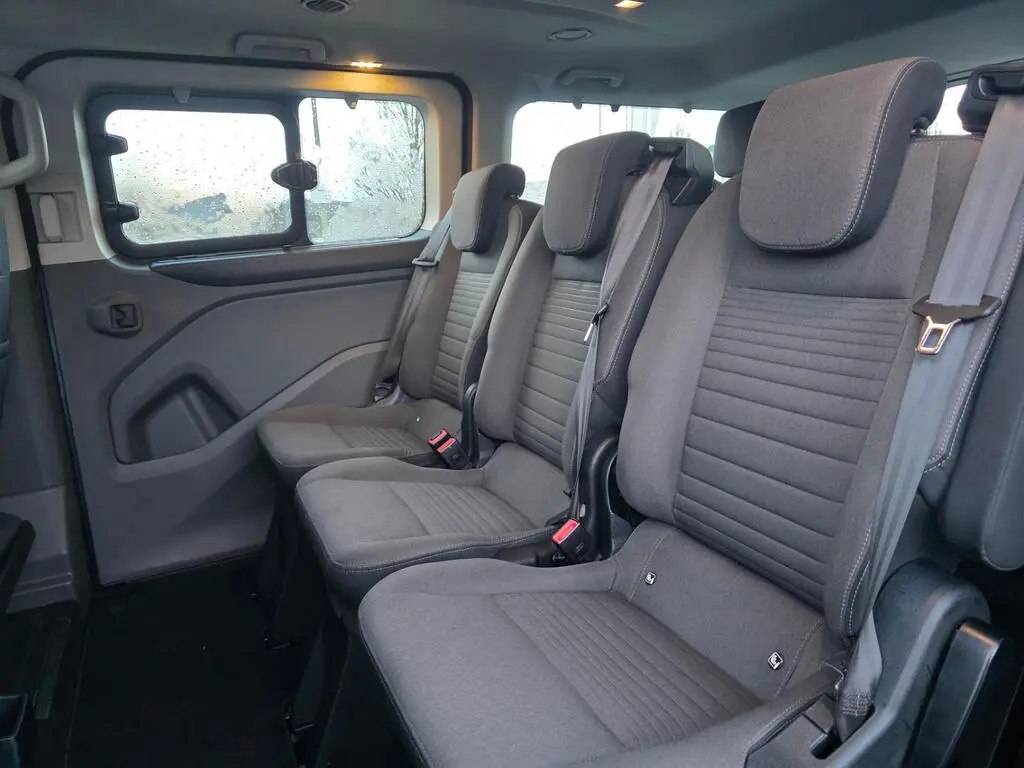 MPV side view of the rear rows seating up to eight passengers